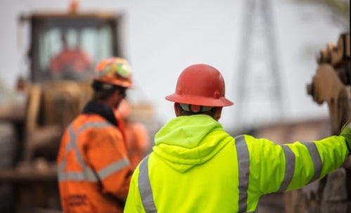 construction supervisor reviewing construction work